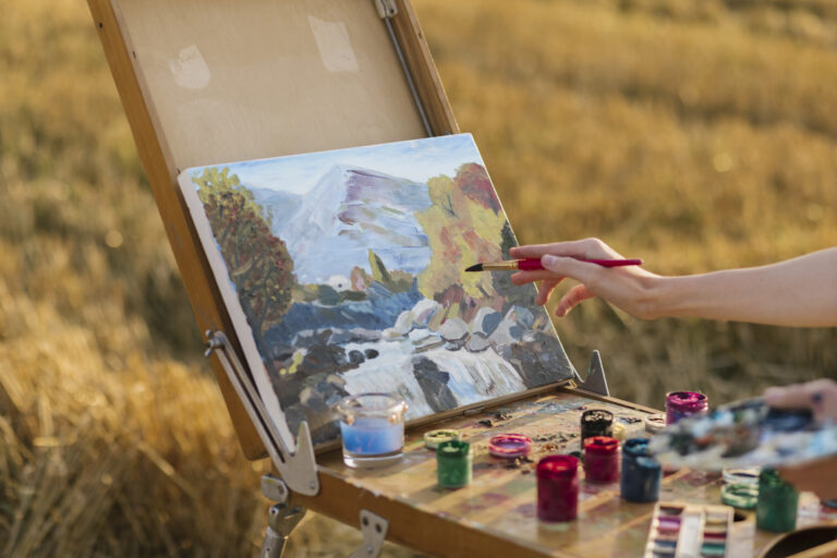 artistic woman painting nature